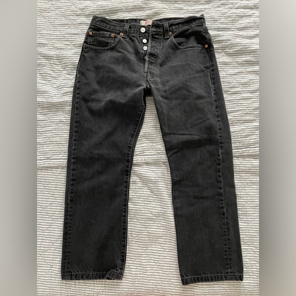 Black Levi’s 501 button fly jeans